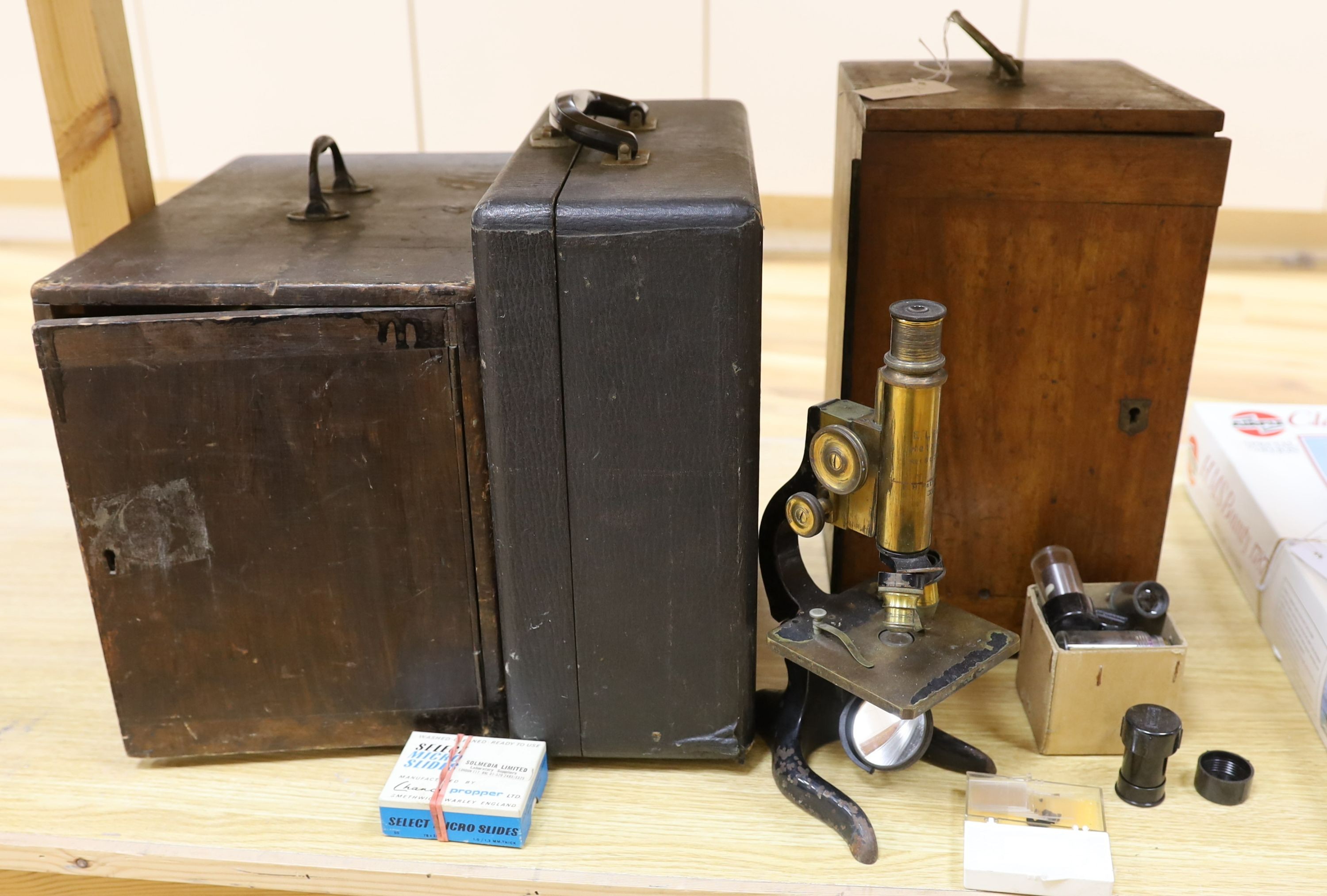 A Victorian sewing machine, Corona typewriter and two microscopes
